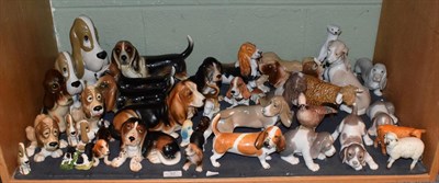 Lot 57 - A collection of ceramic animals, mostly Bassett hounds, to include Beswick Jay no. 2417, a...