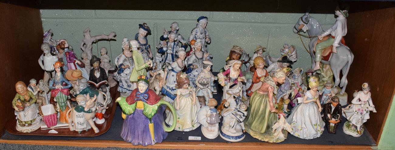 Lot 72 - A large quantity of Continental porcelain bisque and composition figures and figure groups