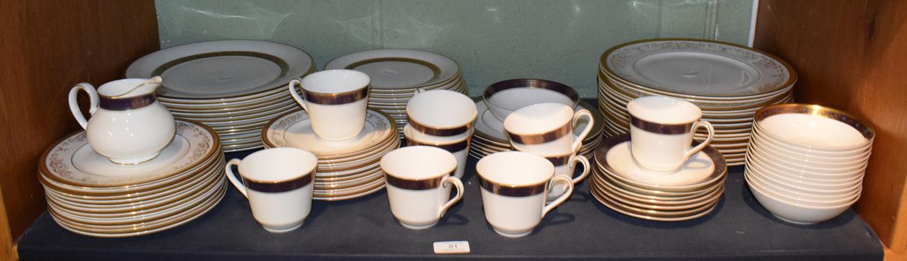 Lot 81 - A Royal Doulton Belmont pattern gold china comprising of: fourteen dinner plates, twelve...