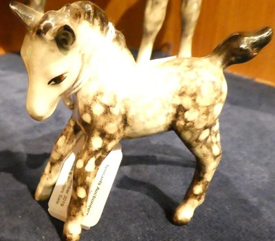 Lot 97 - Beswick Swish Tail Horse, model No. 1182 and Foal (Small, Gambolling Left), model No. 996, both...