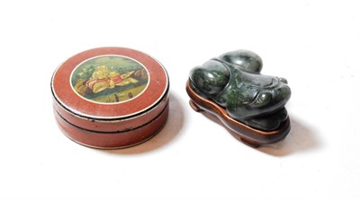 Lot 117 - A Louis XVI Vernis Martin circular snuff box; and a stone toad on wood stand (2)
