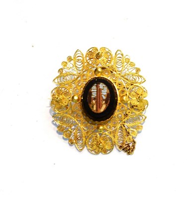 Lot 193 - A mosaic brooch within a filigree mount, measures 3.8cm by 3.5cm