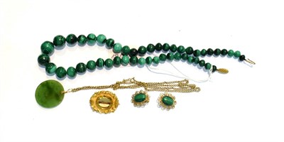 Lot 195 - A citrine brooch, unmarked, measures 3.2cm by 2.5cm; a single row malachite bead necklace with...