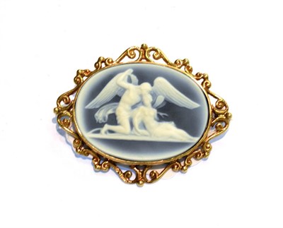 Lot 202 - A 9 carat gold cameo brooch within a scroll surround, measures 5.5cm by 4.5cm