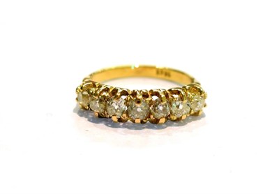 Lot 203 - A seven stone diamond ring, the graduated old cut diamonds in yellow claw settings, to a...