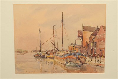 Lot 681 - Frederick (Fred) Lawson (1888-1968) Figures, barges and other boats on a canal Signed and dated...