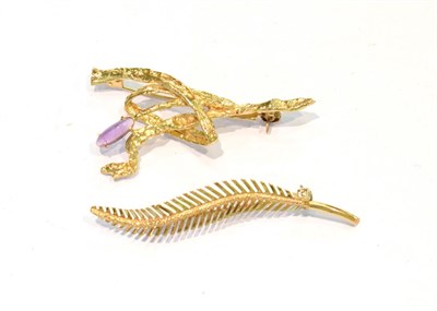 Lot 225 - An abstract 9 carat gold brooch, length 5.2cm; together with a feather brooch, length 5.9cm