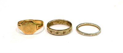 Lot 231 - A 9 carat gold signet ring, finger size Q1/2; a band ring stamped 'PLATINUM', finger size L1/2; and