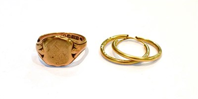 Lot 237 - A 9 carat gold signet ring, band cut; and a pair of 9 carat gold hoop earrings