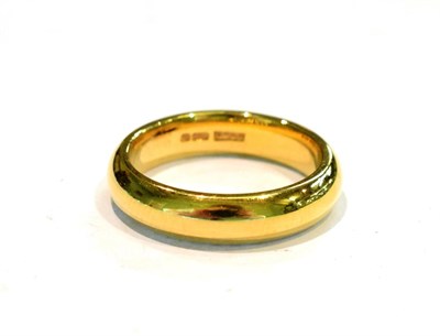 Lot 239 - An 18 carat gold band ring, finger size R