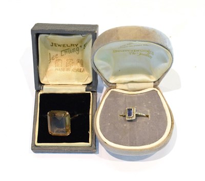 Lot 244 - A sapphire and diamond ring, stamped '18CT' and 'PLAT, finger size P; and a further gem set...