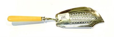 Lot 247 - A William IV silver mounted ivory fish-slice, London, 1835, the plain carved ivory handle with...