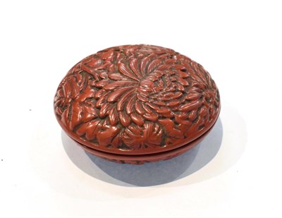 Lot 280 - A red cinnabar lacquer compact, circular form, 7.5cm diameter