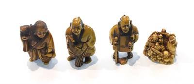 Lot 285 - A Japanese ivory netuske, Meiji period, modelled as a group of assorted figures, signed, 3cm...