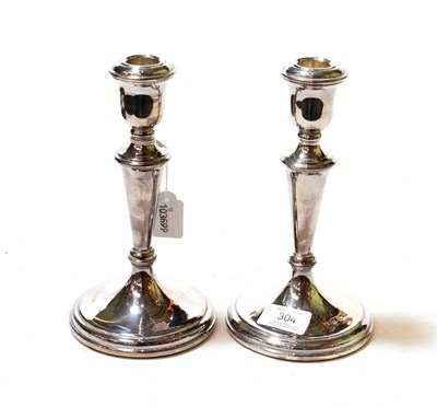 Lot 304 - A pair of Irish silver candlesticks, by Alwright & Marshall Ltd, Dublin, 1997, each on slightly...