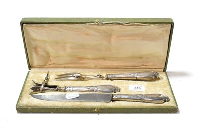 Lot 316 - A French silver-mounted carving-set, maker's mark perhaps CF or CT, Late 19th Century, the...