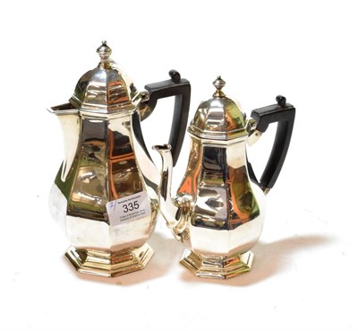 Lot 335 - An Edward VII small silver coffee-pot and an Edward VII silver hot-water jug, by Thomas...