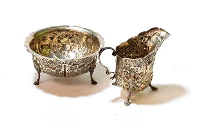 Lot 341 - A Victorian Irish silver cream-jug and sugar-bowl, by Edmond Johnson Ltd., Dublin, 1899, each...