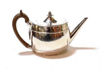 Lot 347 - A George III silver teapot, by John Touliet, London, 1792, oval, the sides with two reeded...