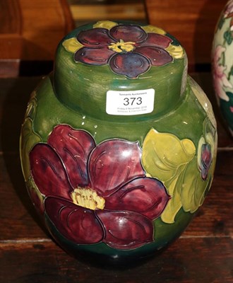 Lot 373 - A Walter Moorcroft pottery ginger jar and cover in the Anemone pattern, circa 1950, with...