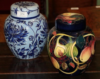 Lot 374 - A modern Moorcroft pottery ginger jar and cover decorated with Chrysanthemums blue on blue, a trial