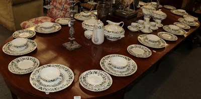 Lot 381 - A Crown Staffordshire dinner service decorated with a floral border for twelve and a coffee service