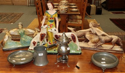 Lot 391 - An Art Deco figure of a girl and hounds signed ARNOVA, numbered 665; another model of a girl...