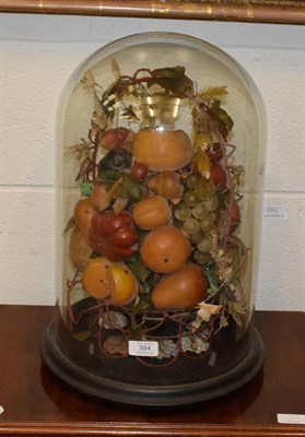 Lot 394 - A Victorian wax fruit diorama under a glass dome