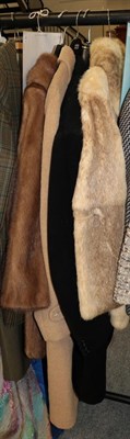 Lot 411 - A Dyson's Leeds pastel mink coat; another in light brown coney fur; Rodex camel coloured...