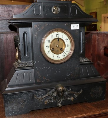 Lot 1128 - A Victorian black slate mantel clock