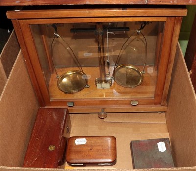 Lot 1142 - A cased set of scales, by Philip Harris Ltd, Birmingham; together with three cased sets of weights