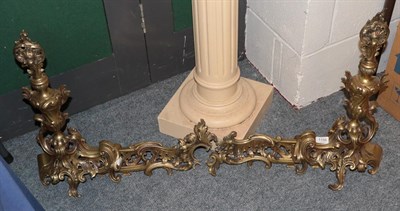 Lot 1156 - A Louis XV style brass fire curb, 136cm wide