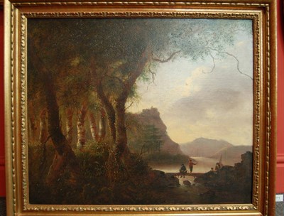 Lot 711 - Follower of Richard Wilson (18th century) Figures fishing beside a lake, a castle in the...