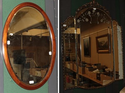 Lot 1216 - An early 20th century triple plate and etched glass mirror, 114cm high; and an Edwardian oval bevel