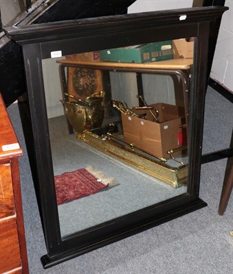 Lot 1222 - A reproduction black painted over mantle mirror