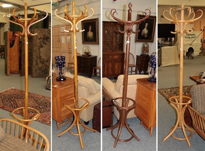 Lot 1227 - Four modern bentwood hat and coat stands (4)