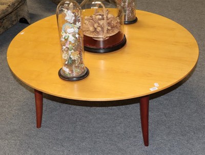 Lot 1233 - A mid 20th century circular beech topped coffee table