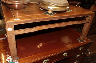 Lot 1243 - ^ An early 20th century Chinese hardwood coffee table, 96cm wide