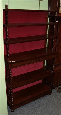 Lot 1250 - A rosewood open bookcase with spiral turned uprights, 86cm wide