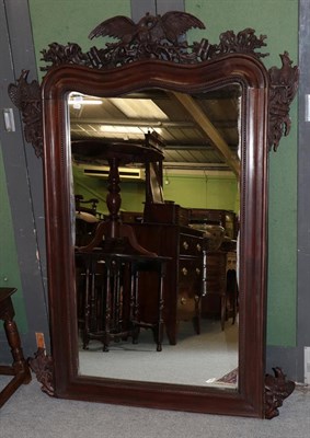 Lot 1252 - A reproduction mahogany framed mirror surmounted with a phoenix and scrolls