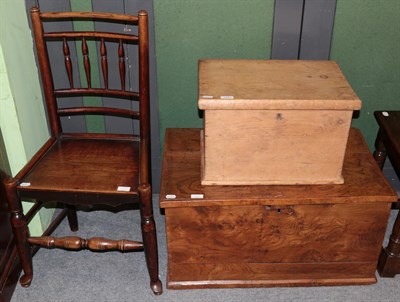 Lot 1253 - An elm spindle back chair; a 19th century elm chest; and a small pine chest (3)