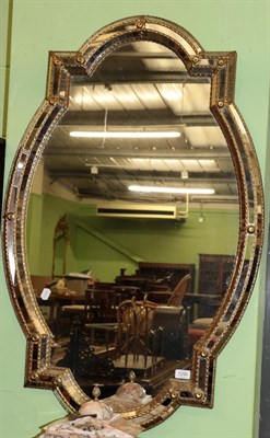 Lot 1256 - A 20th century Italian mirror, 110cm high