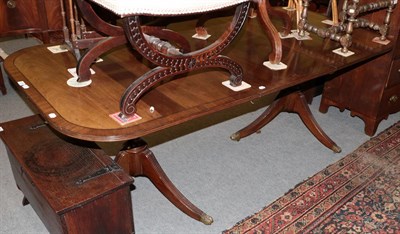 Lot 1275 - A Regency style mahogany twin pedestal dining table