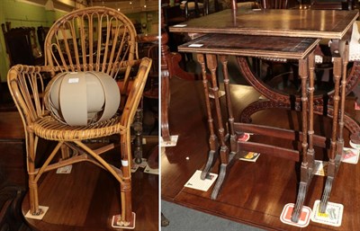 Lot 1276 - A 1970s plastic lamp shade, a modern cane open armchair, and two small inlaid tables from a nest