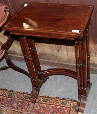 Lot 1288 - A set of three Victorian rosewood nesting tables, the largest 48cm wide