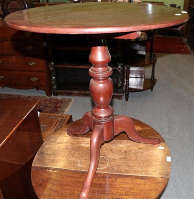 Lot 1296 - A mahogany flip top tripod table