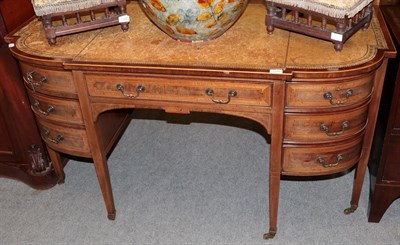 Lot 1299 - A late Victorian mahogany and satinwood banded desk, with leather writing surface, 141cm wide