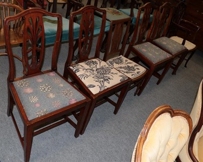 Lot 1320 - A set of four George III style dining chairs; an Edwardian bedroom chair; and an Edwardian mahogany