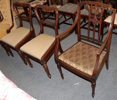 Lot 1323 - A pair of Gillows dining chairs together with a carved mahogany armchair (3)