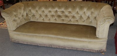 Lot 1324 - A late Victorian green buttoned Chesterfield sofa, 202cm wide